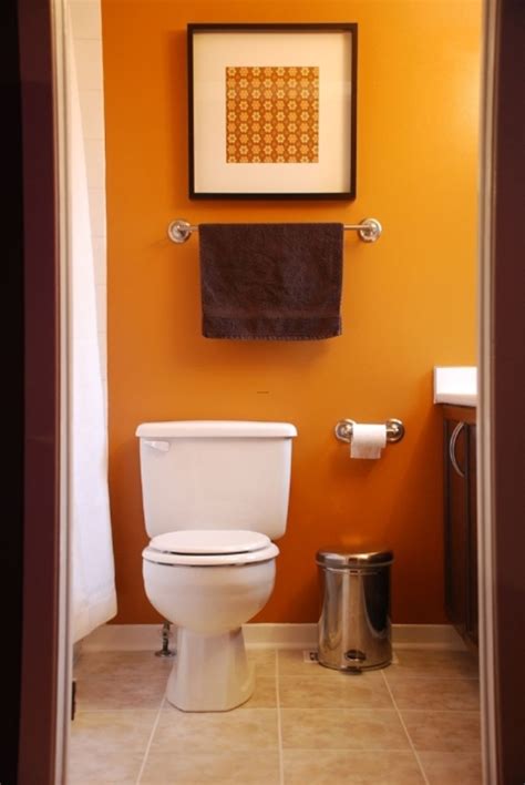 The wall hung toilet and dark floor also enhance the feeling of space. 30 Beautiful Small Bathroom Decorating Ideas