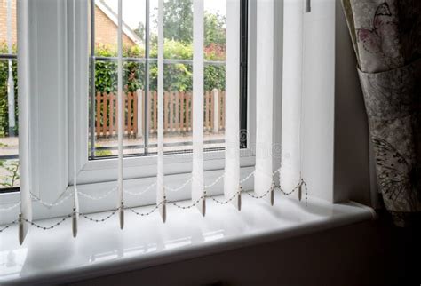 Shallow Focus Of Vertical Blinds And A Newly Installed Double Glazed