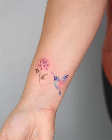 Little Hummingbird And Peony Tattoo Inked On The Right Wrist Tattoo