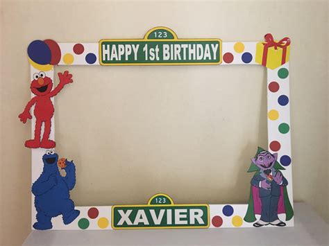 A Happy 1st Birthday Photo Frame With Sesame Street Characters