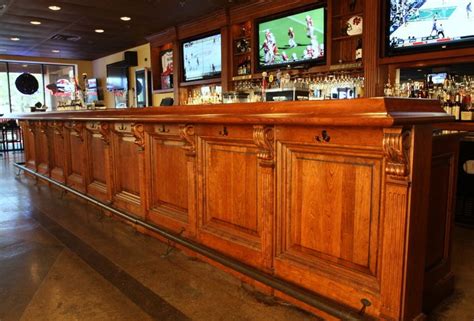 Bar Front Panel With Vertical Fluted Trim Beneath Corbels Wet Bar