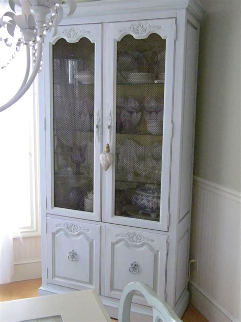 A new larger window floods the kitchen in natural light. Maison Decor: French Wallpaper for My Cabinet