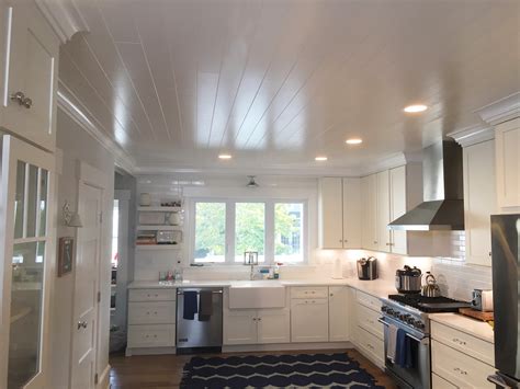 This easy and economical upgrade is a quick way to add some lasting natural curb appeal to the home. How to Install a Wood-Look Plank Ceiling • Ron Hazelton