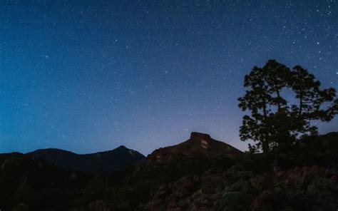 Tree Rocks Mountain Under Starry Blue Sky During Nighttime 4k Hd Nature