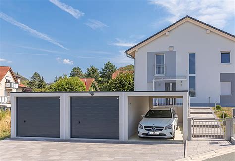 Offene, schwarze küche mit großer kochinsel. Beton-Carport - Die wandelbare offene Garage - Garagen-Welt