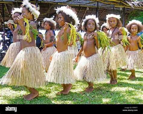 Melanesian Girls In Tribal Festival Dress Dancing At Alotau Papua New