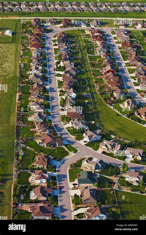 An Aerial View Of Tract Housing In A Suburban Housing Subdivision Near