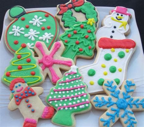 For my house, most of the icings will be pink, purple and blue because they are my kids' favorite colors. Iced Christmas Sugar Cookies | Christmas sugar cookies, Christmas cookie party, Christmas sugar ...