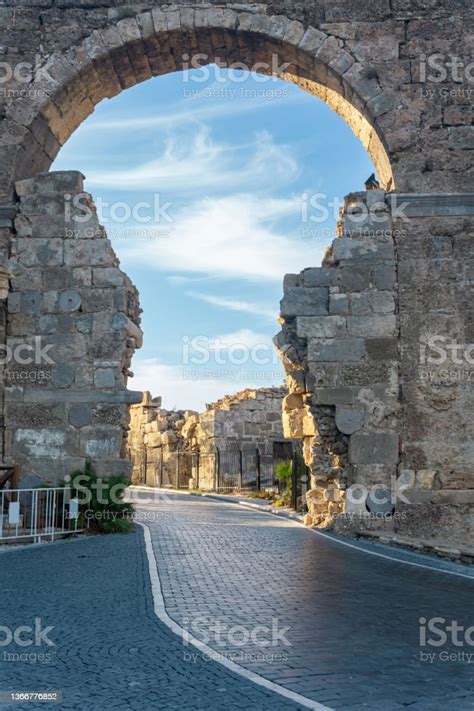 Road Passes Through The Ancient Vespasian Gate In Side Turkey Stock