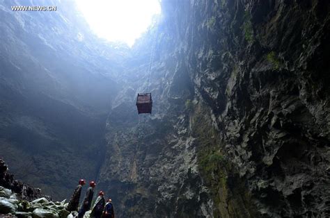 Rubbish Clearance Starts In Chinas Tiankeng To Develop Karst Landform