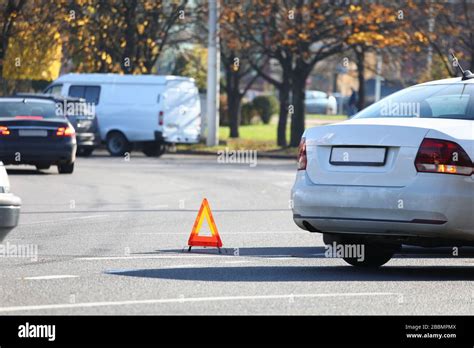There Is Yellow Triangle Accident Sign On Road Stock Photo Alamy