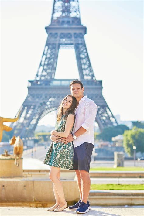 Young Romantic Couple In Paris Near The Eiffel Tower Stock Image