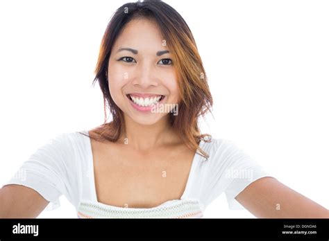 Pretty Asian Woman Smiling At The Camera Stock Photo Alamy