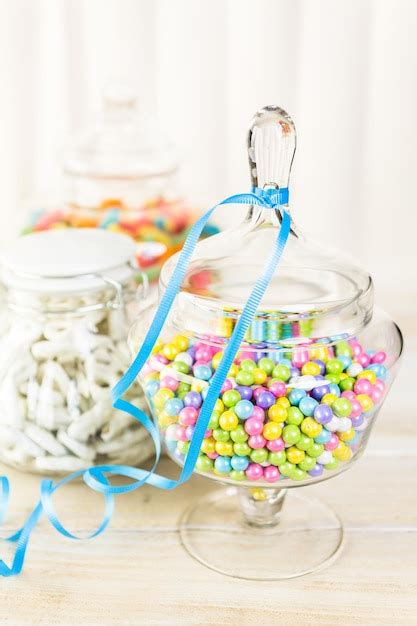 Premium Photo Multicolored Candies In Glass Candy Jars