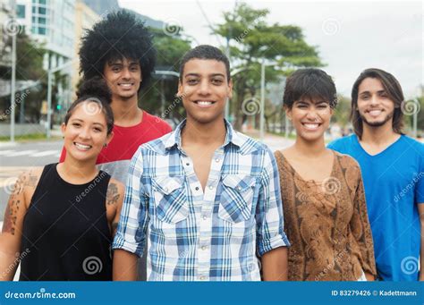 Group Of Laughing Urban Young Adult People In The City Stock Photo