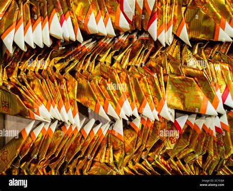 Gold Chinese Joss Paper Aka Ghost Money Spirit Money Or Hell Bank Notes Folded Into The Shape