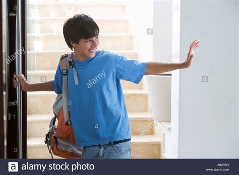 A Young Boy Leaving For School Stock Photo Royalty Free Image