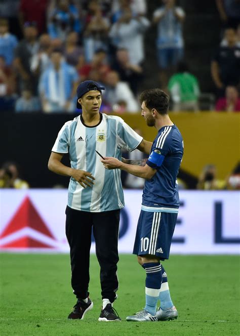 Argentina Fan Runs On The Pitch To Hug Lionel Messi Gets Jersey Signed