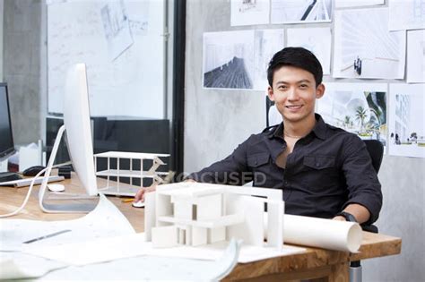 Chinese Male Architect Working In Office — Occupation Front View