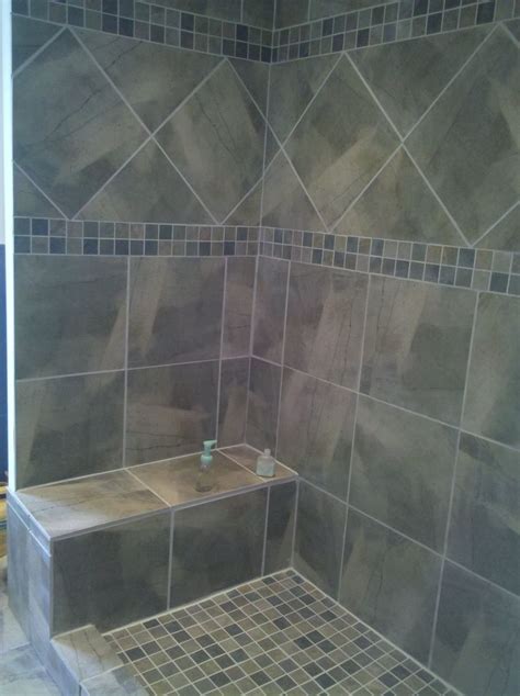 Forget boring usual tiles, today's design industry offer a wide range of gorgeous bold and patterned tiles to cover your walls, shower area and floor. Sophisticated Gray Diagonal Tiled Shower Patern With ...