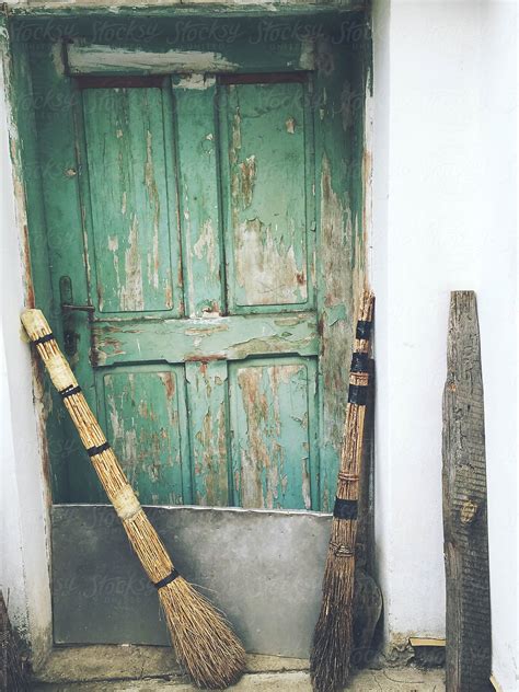 Old Door And Brooms By Stocksy Contributor Jovana Rikalo Stocksy