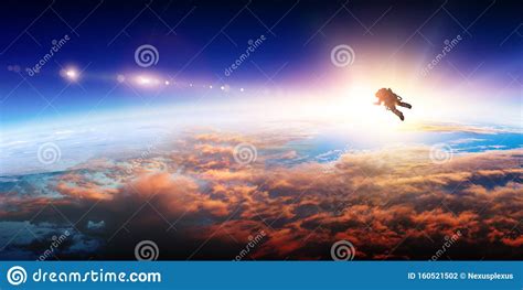 Spaceman And Planet Human In Space Concept Stock Photo Image Of