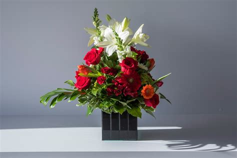 May this help make the mourning process even a shred less difficult. Sympathy Arrangement #2 - Luda Flower Salon