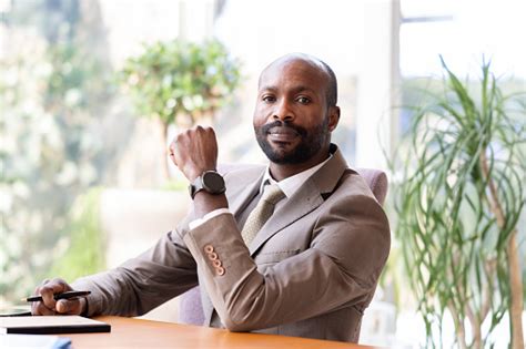 Portrait Of A Confident Black Businessman Stock Photo Download Image