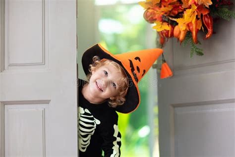 Kids Trick Or Treat Halloween Child At Door Stock Image Image Of