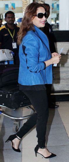 Madhuri Dixit In Casual Jeans And White T Shirt Which She Teamed With