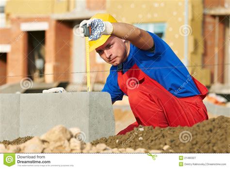 Builder with measure tape stock image. Image of carpentry - 21480327