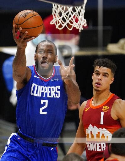 Nuggets stay hot with huge road win over clippers. Clippers Nuggets Basketball | Buy Photos | AP Images ...