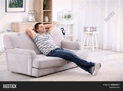 Young Man Relaxing On Image And Photo Free Trial Bigstock