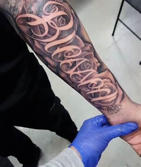 Outer forearm tattoos are also easy to do, making them a great place for more elaborate and detailed designs. 60 Blessed Tattoos For Men - Biblical Lettering Design Ideas