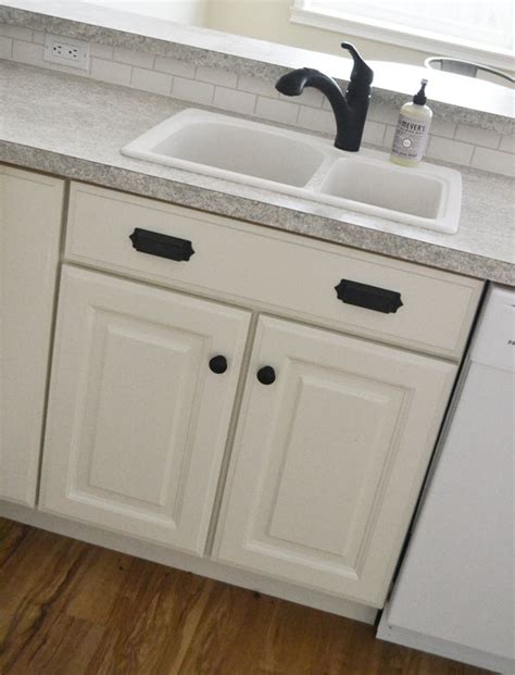 Standard sink base cabinets are 24″ deep (back to front), and most sinks are designed to fit that size. 30" Sink Base - Momplex Vanilla Kitchen | Ana White