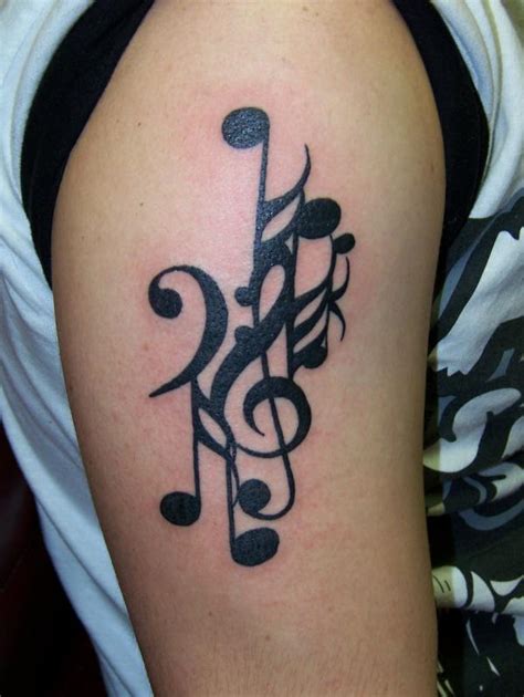 These music symbols tattoos designs can go on any part of the body; Music Tattoos for Men - Ideas and Inspiration for Guys