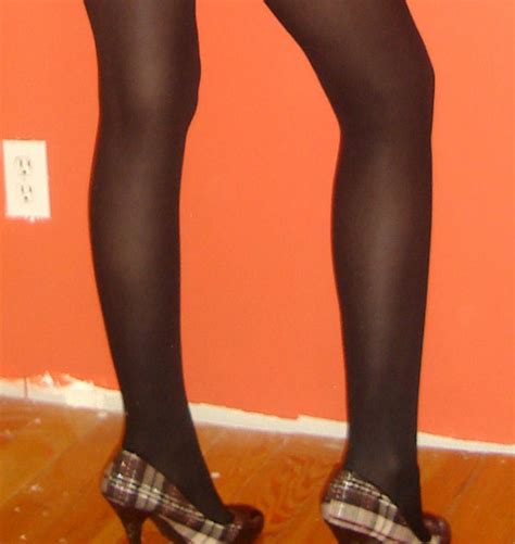 women`s legs and feet in tights legs and feet in black and tan tights 8