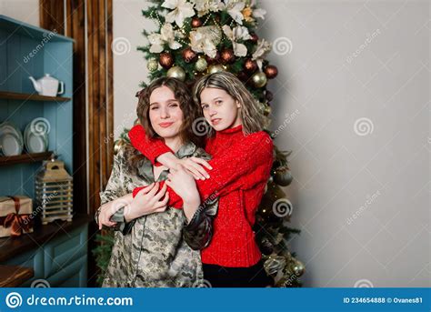 Lesbian Couple Together Indoors Cheerfully Communicate Preparing For Celebration Of Christmas
