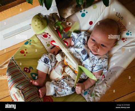 Baby In Toy Bouncer Stock Photo Alamy