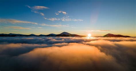 Premium Photo Aerial View Of Vibrant Sunrise Over White Dense Fog