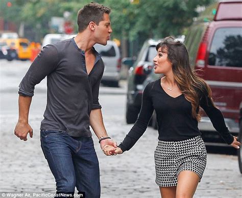 clad in sexy knee high boots lea michele throws out some moves in manhattan for the new