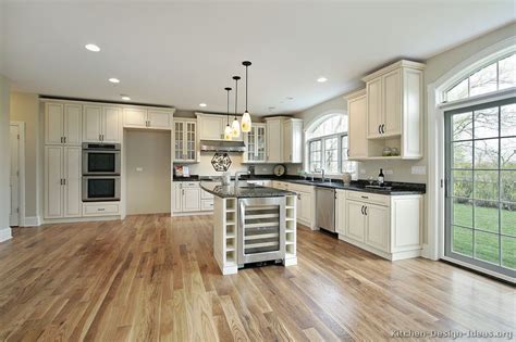 For wooden kitchen flooring, oak is generally the most common although other options include maple, walnut, hickory, and birch. Pictures of Kitchens - Traditional - White Kitchen ...