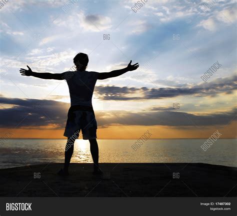 Man Standing On Rock Image And Photo Free Trial Bigstock