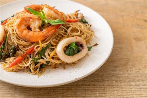 Stir Fried Chinese Noodle With Basil Chilli Shrimps And Squid Stock Image Image Of Pepper