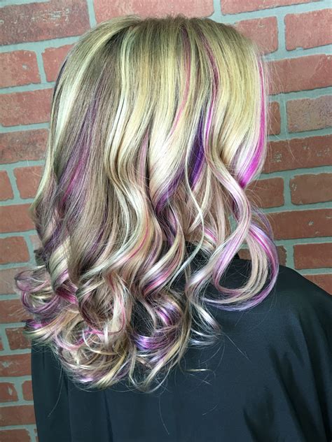 Subtle and ever so slightly darker than a classic honey blonde hair colour, this shade brings a hint of pink to blonde hair, creating a truly stunning look. Pink purple blonde peekaboos highlights | Purple ...
