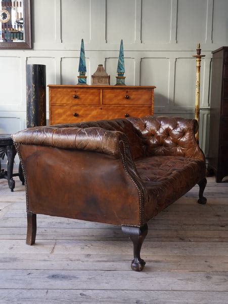 A Tan Leather Buttoned Sofa Drew Pritchard Ltd