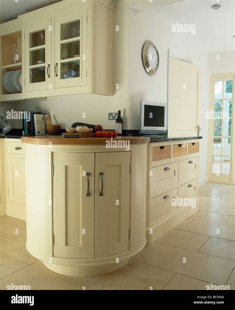 Curved Fitted Unit In Large Traditional Cream Country Kitchen Painted