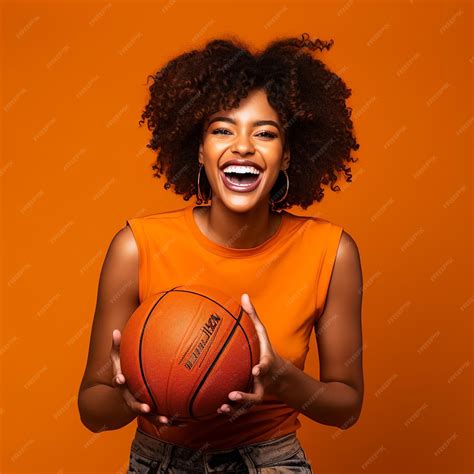 Premium Ai Image Photo Of A Black Female Sports Fan Girl Excited And Holding A Ball In Front