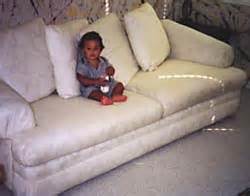 Drape the slipcover over the back of the 3. Tips for Fitting Slipcovers on Sofas with Loose Cushions ...