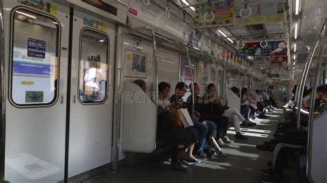 Tokyo Metro Full Underground Metro Train During Rush Hour In Tokyo Metro Passengers Look Into
